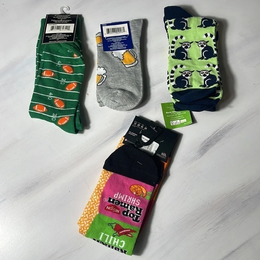 4 pairs of men socks. Football. Top Ramen. Beer. Lemur size 6-12